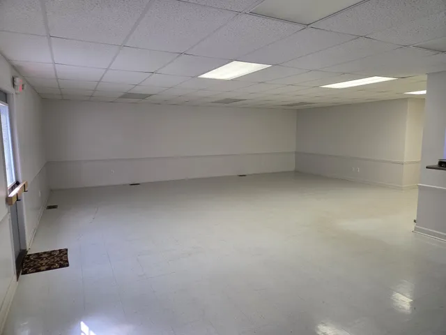 a kitchen with stainless steel appliances granite countertop a stove and a refrigerator