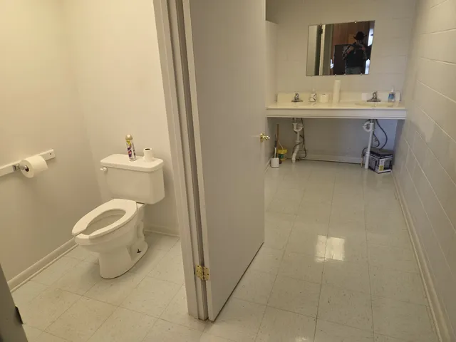 a room with furniture and a window