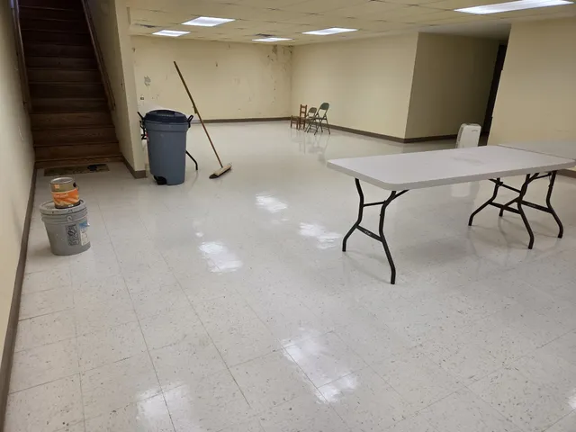 a view of a room with table and chair
