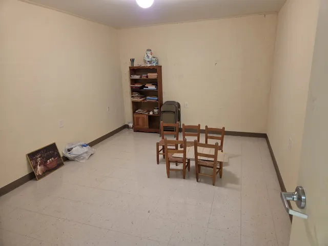 a view of workspace with lounge chair