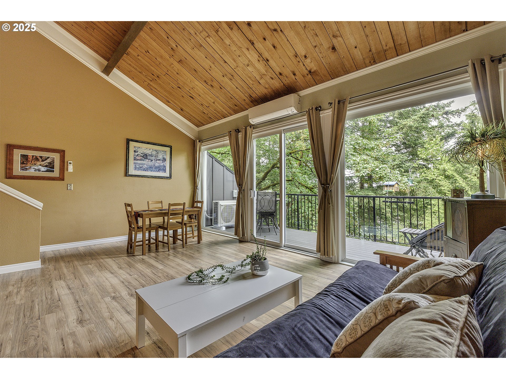 4 Touchstone, Unit 113 Lake Oswego, OR 97035 - Photo 11 of 32 a living room with furniture and a large window