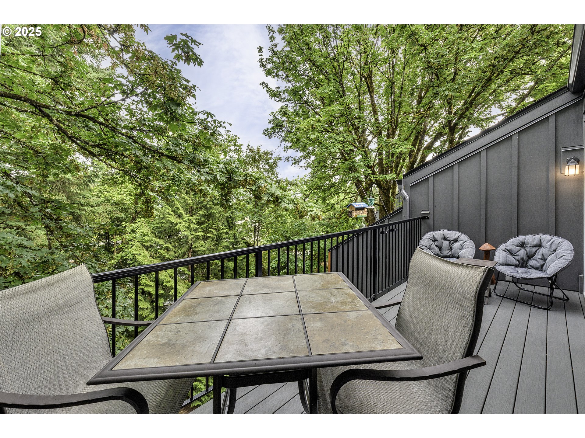 4 Touchstone, Unit 113 Lake Oswego, OR 97035 - Photo 26 of 32 a view of balcony with wooden floor and outdoor seating