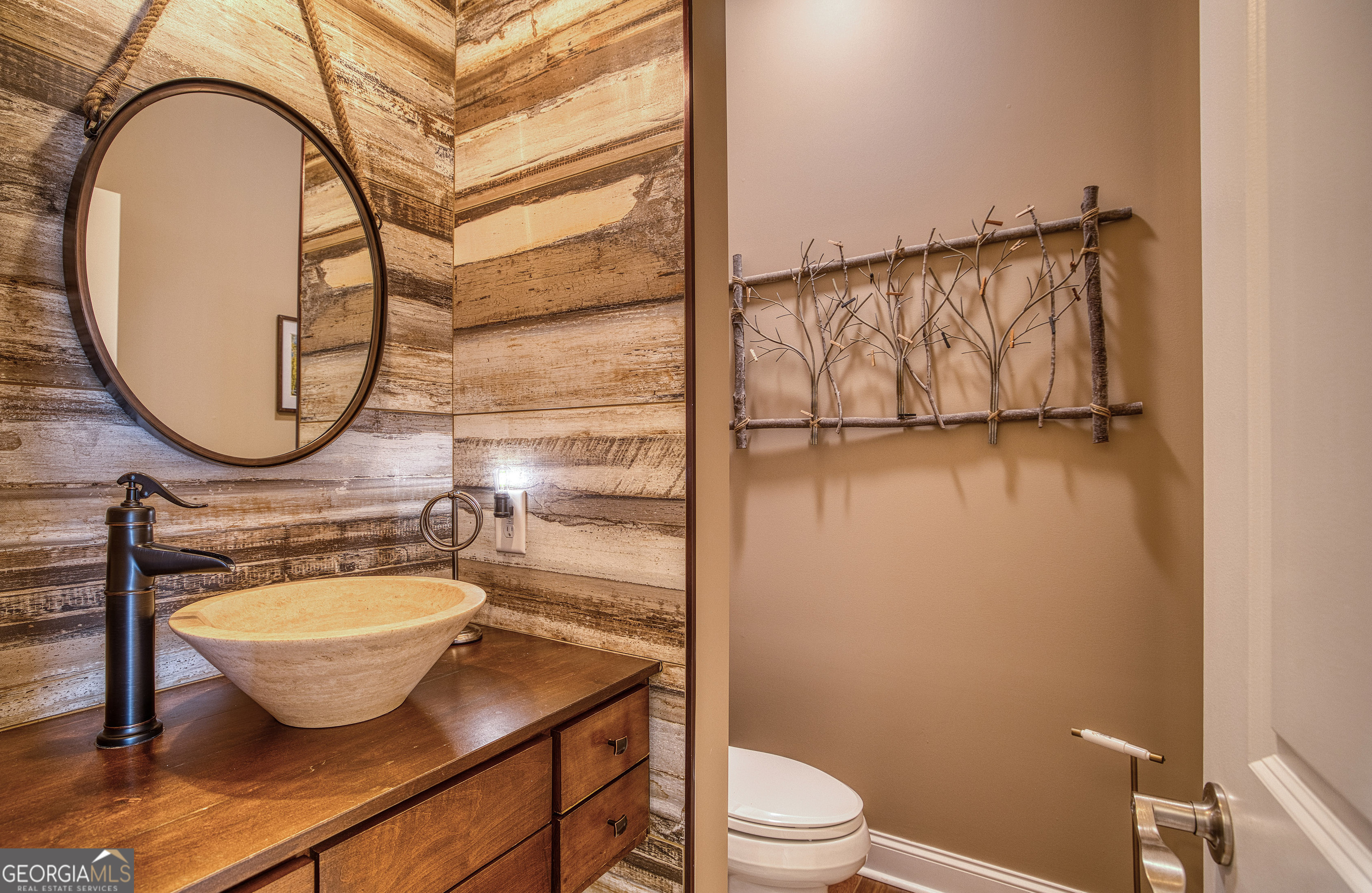 112 Springhill Lane Clarkesville, GA 30523 - Photo 25 of 79 a bathroom with a toilet a sink and a mirror