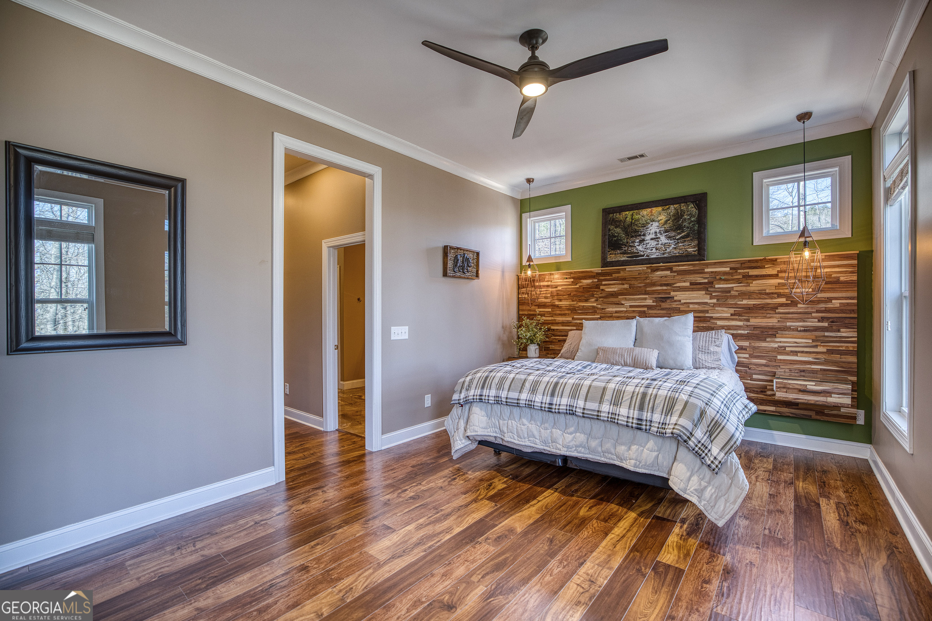 112 Springhill Lane Clarkesville, GA 30523 - Photo 29 of 79 a spacious bedroom with a bed and a flat screen tv