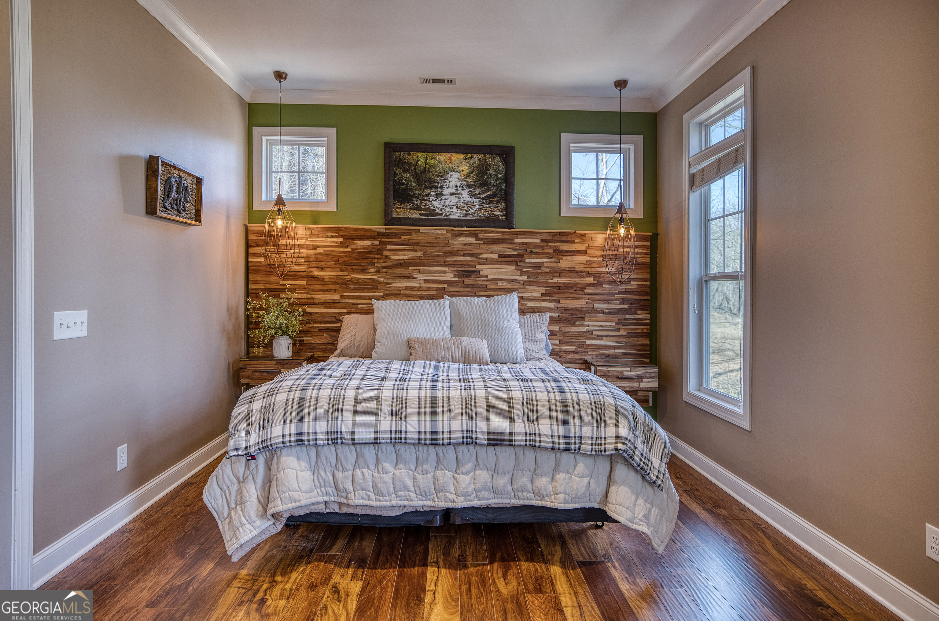 112 Springhill Lane Clarkesville, GA 30523 - Photo 30 of 79 a bedroom with a bed and wooden floor