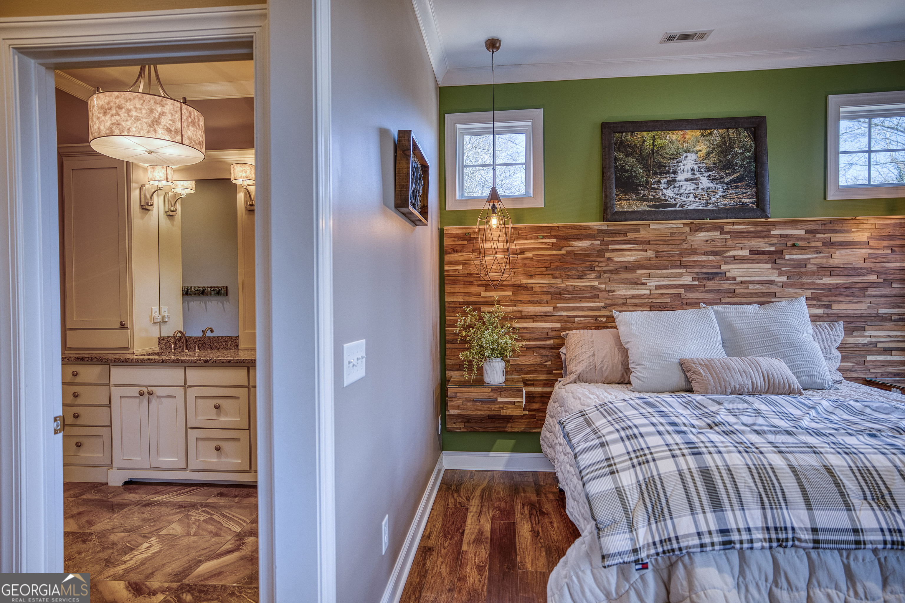 112 Springhill Lane Clarkesville, GA 30523 - Photo 31 of 79 a bedroom with a bed and a painting on the wall