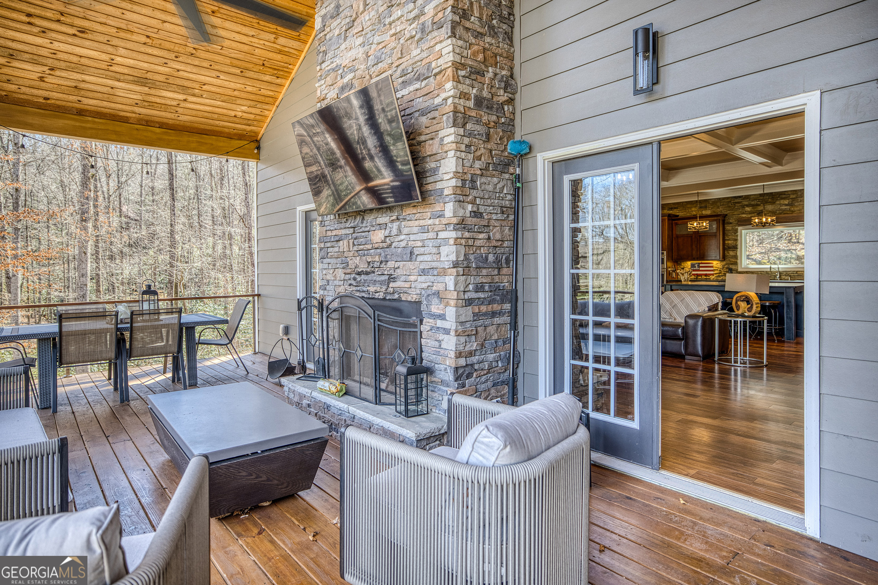 112 Springhill Lane Clarkesville, GA 30523 - Photo 37 of 79 a balcony with furniture and wooden floor