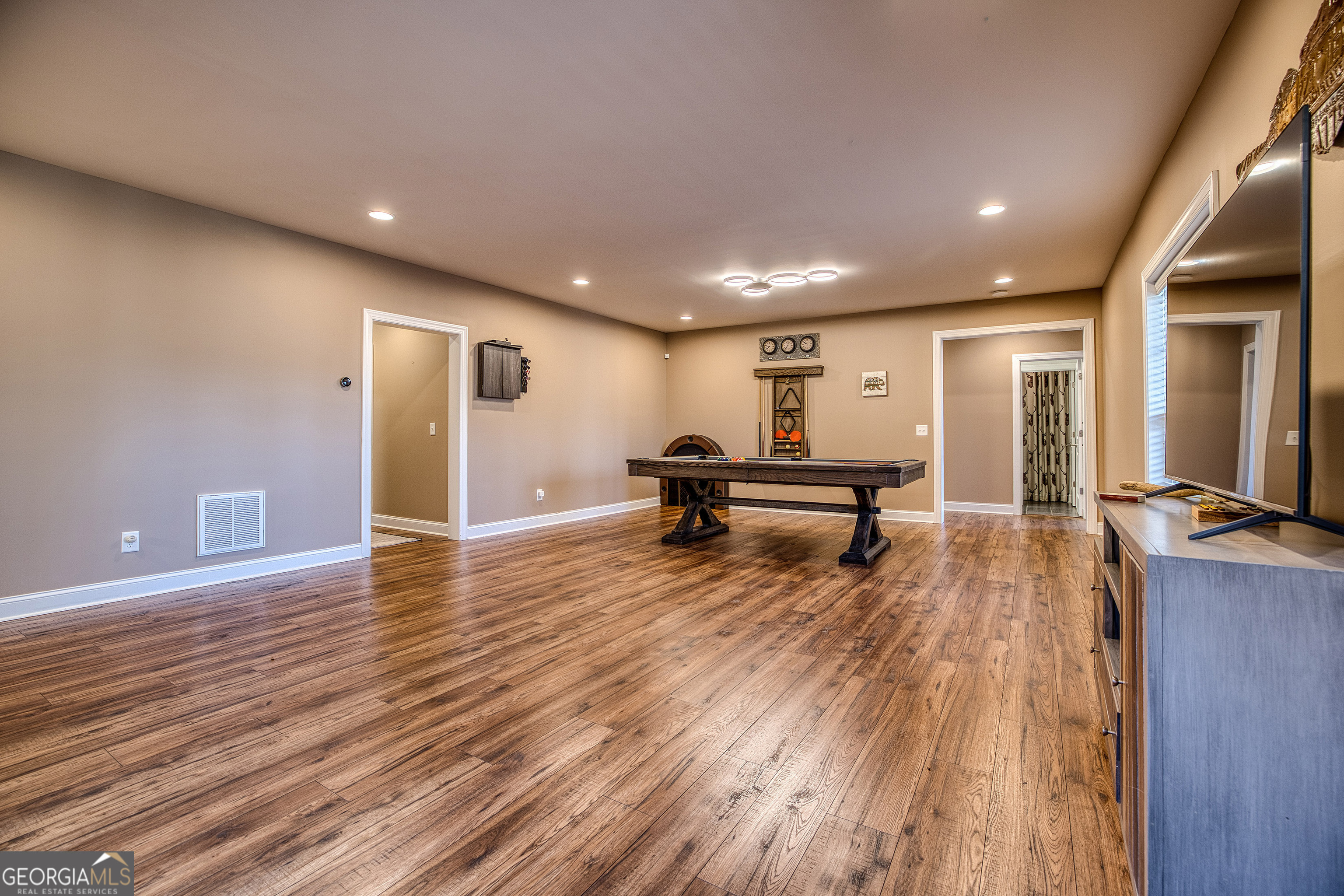 112 Springhill Lane Clarkesville, GA 30523 - Photo 40 of 79 a view of a living room a kitchen and wooden floor