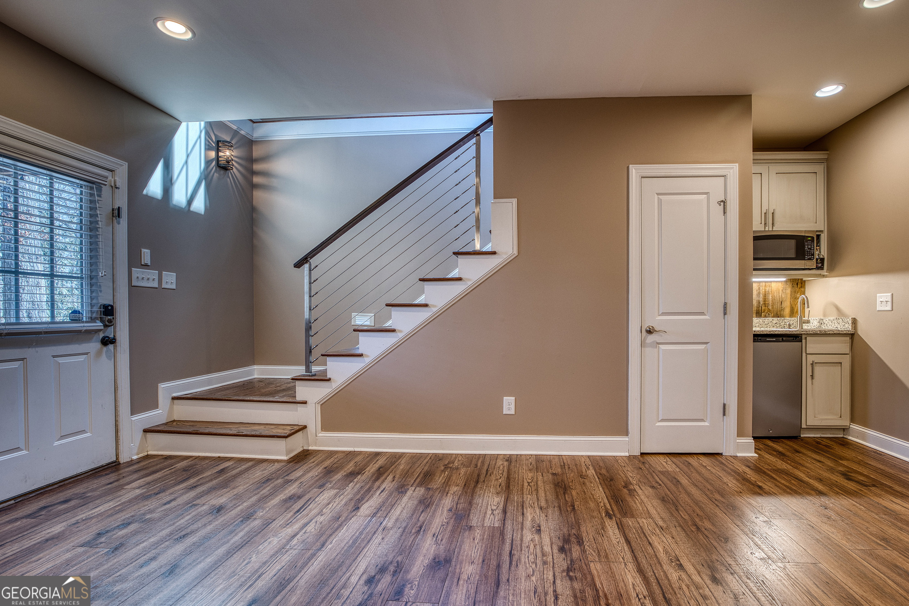 112 Springhill Lane Clarkesville, GA 30523 - Photo 43 of 79 a view of entryway and hall with wooden floor