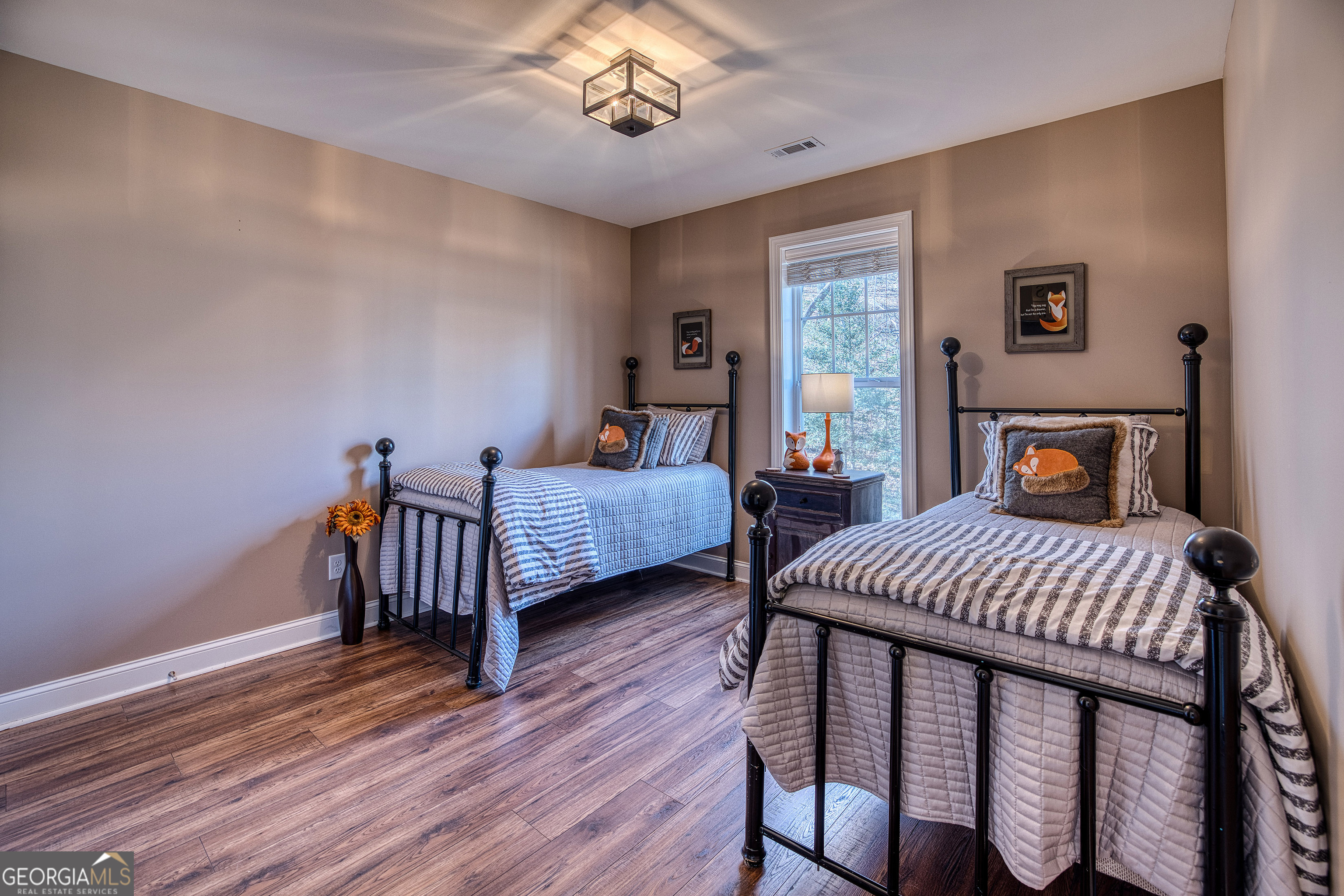 112 Springhill Lane Clarkesville, GA 30523 - Photo 46 of 79 a bedroom with two beds and wooden floor