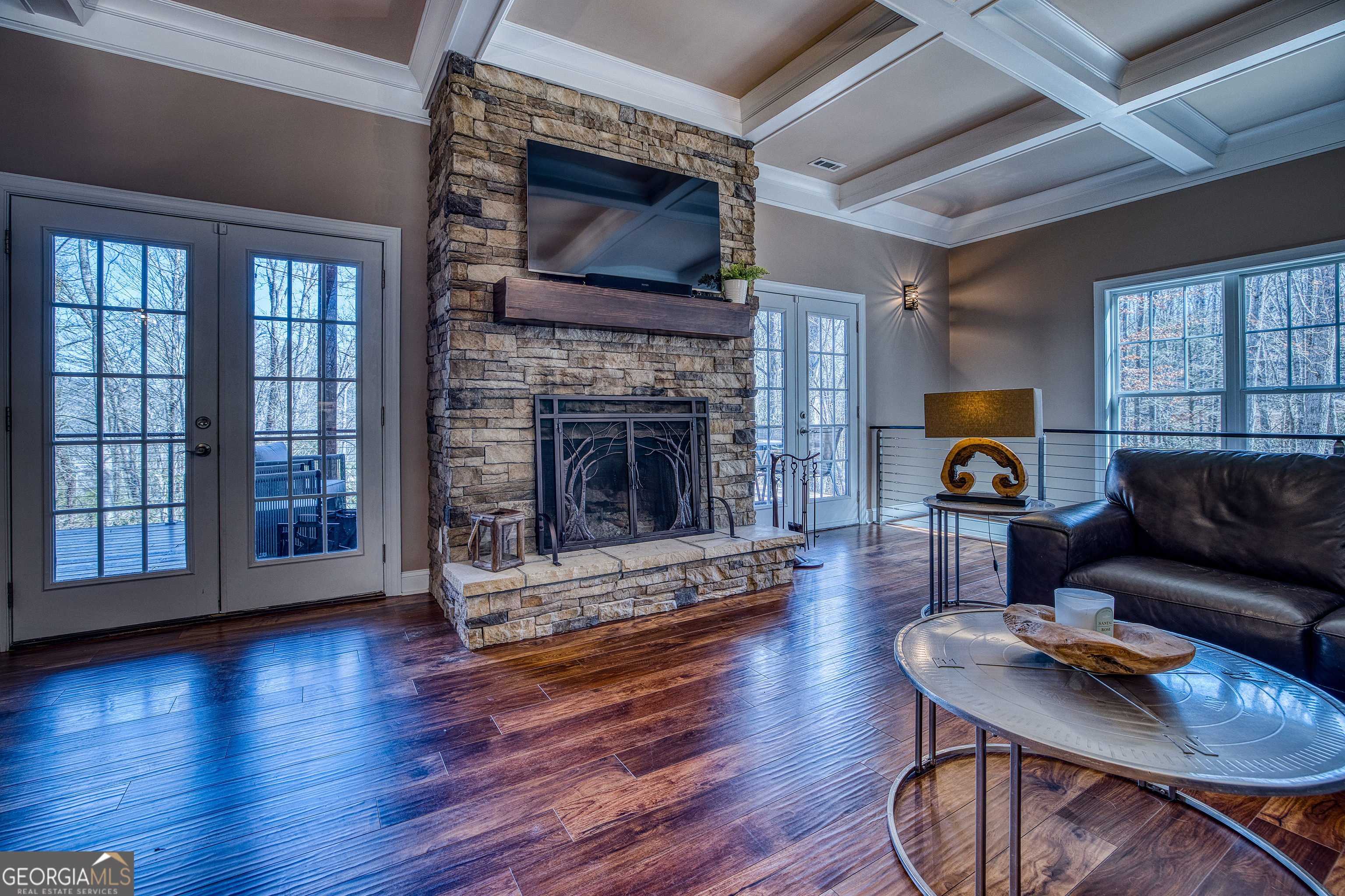 112 Springhill Lane Clarkesville, GA 30523 - Photo 6 of 79 a living room with furniture wooden floor and a fireplace