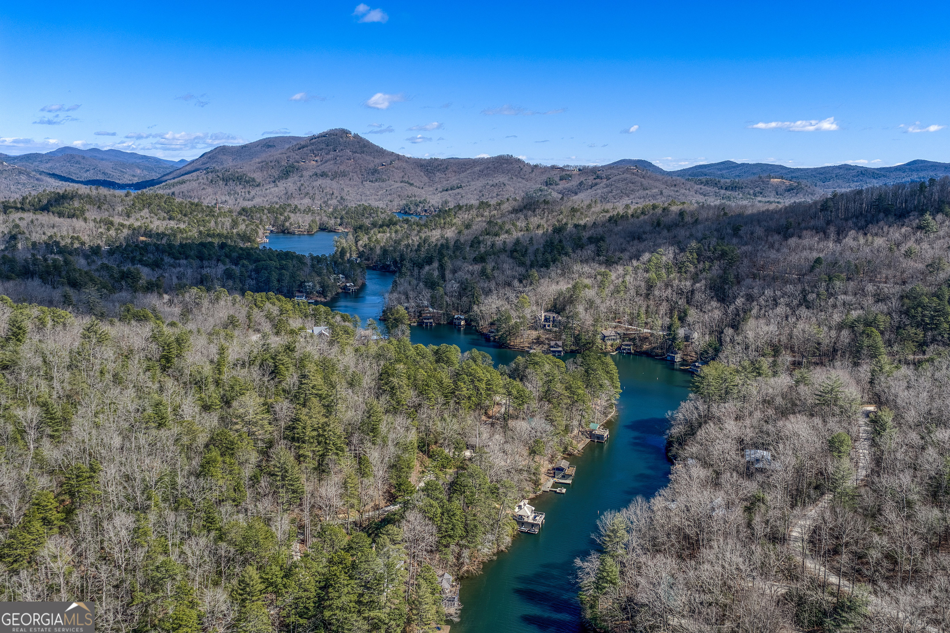 112 Springhill Lane Clarkesville, GA 30523 - Photo 76 of 79 a view of a lake with mountains in the background