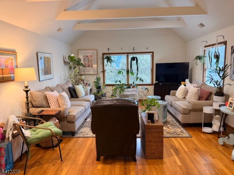 35 Seminary Avenue, Unit 3 Chester, NJ 07930 - Photo 3 of 9 a living room with furniture and a large window