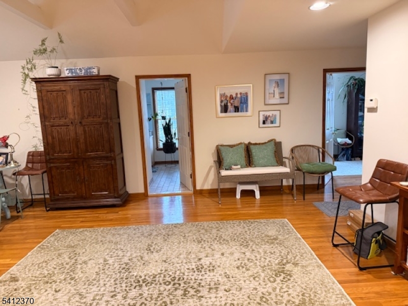 35 Seminary Avenue, Unit 3 Chester, NJ 07930 - Photo 4 of 9 a living room with furniture and wooden floor