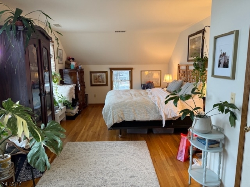 35 Seminary Avenue, Unit 3 Chester, NJ 07930 - Photo 6 of 9 a living room with furniture and a potted plant
