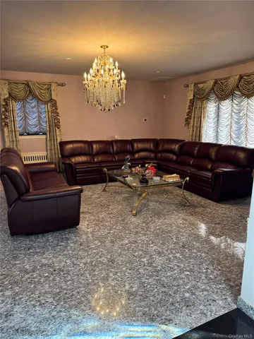 a view of a room with furniture window and outside view