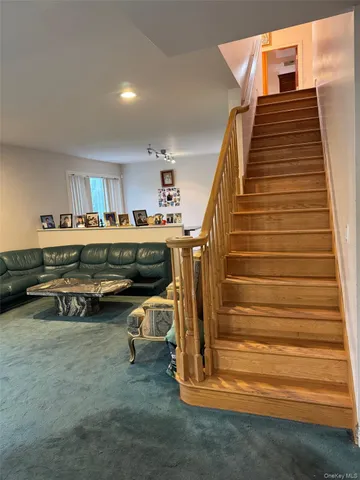 a view of a living room and window