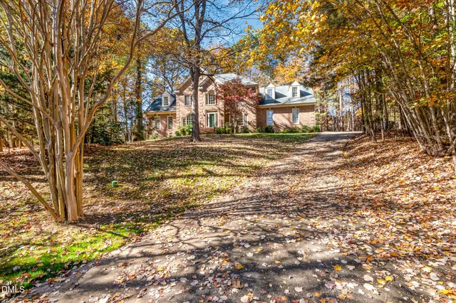 a picture of a bench in front of a wall
