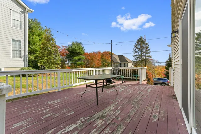 a view of a balcony with chairs