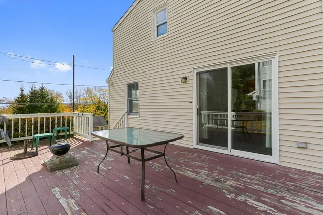 a view of a terrace with wooden floor and outdoor space