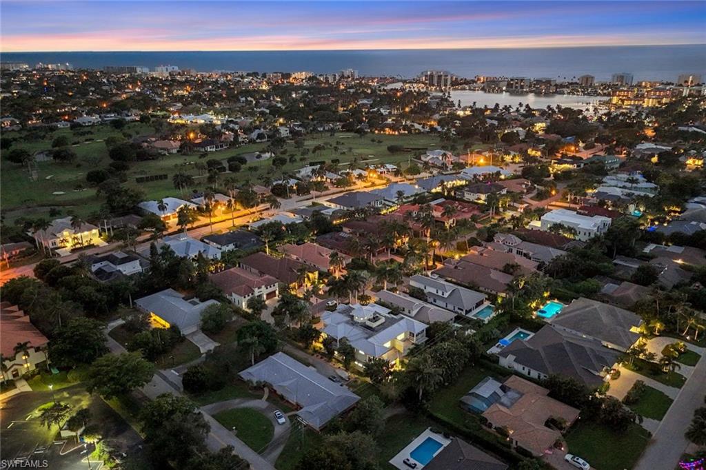 699 Fairway Terrace Naples, FL 34103 - Photo 43 of 46 an aerial view of residential houses with outdoor space