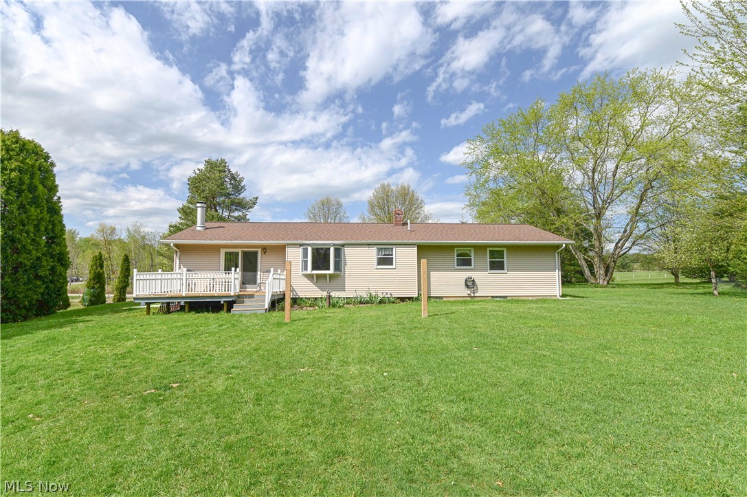 13425 Chardon-Windsor Road Chardon, OH 44024 - Photo 47 of 50 Back of house with a deck and a yard