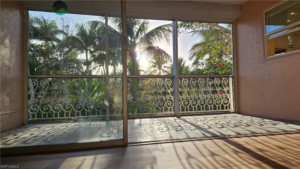 301 6th Avenue South, Unit D Naples, FL 34102 - Photo 2 of 29 Wodnerful lanai to enjoy the Gorgeous Sunsets