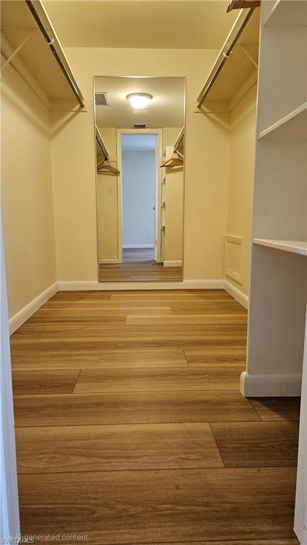 301 6th Avenue South, Unit D Naples, FL 34102 - Photo 21 of 29 Master walk-in closet