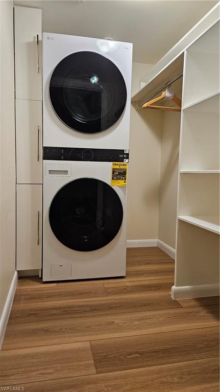 301 6th Avenue South, Unit D Naples, FL 34102 - Photo 27 of 29 Stack washer & Dryer in guest bedroom