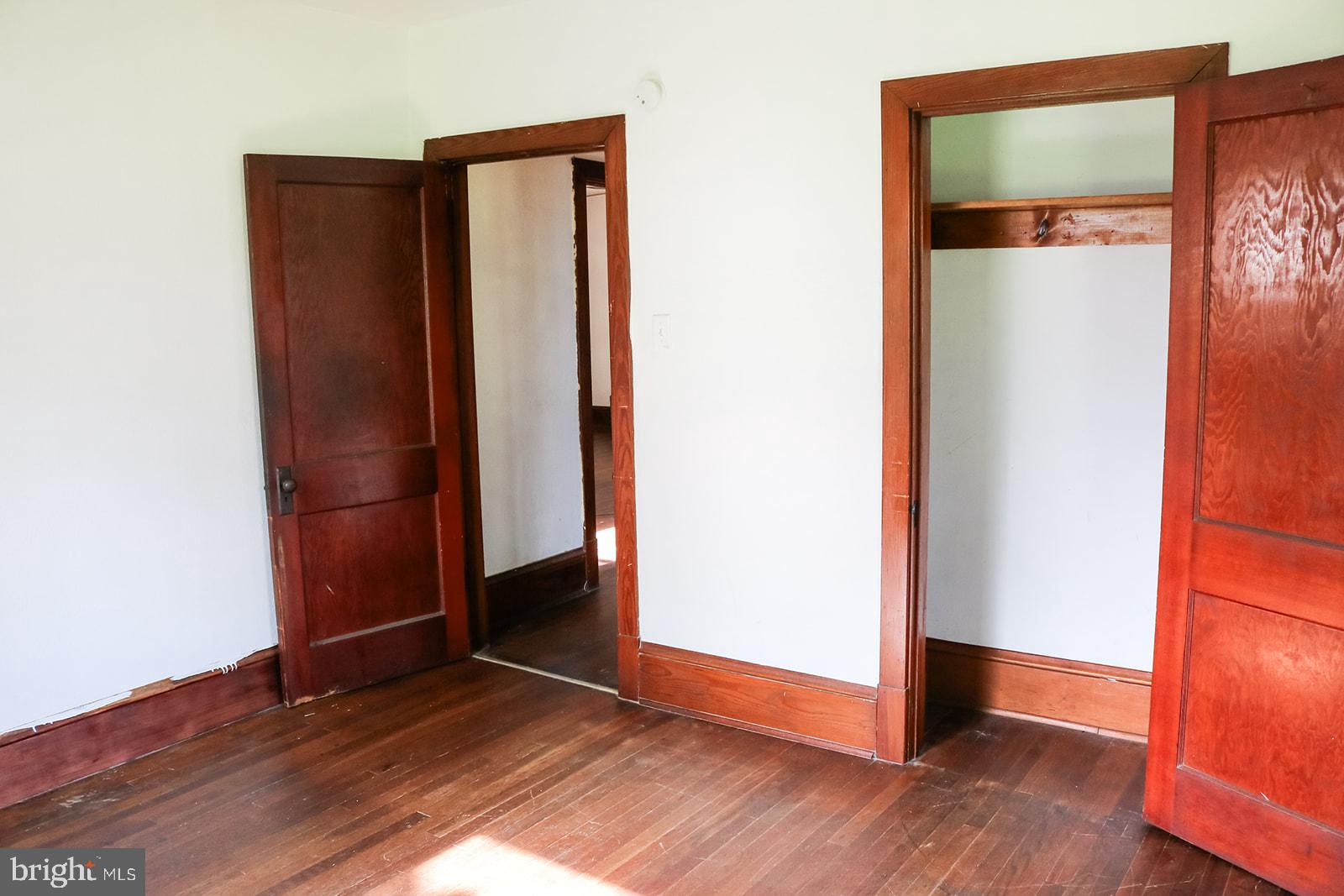 1508 Market Street Schellsburg, PA 15559 - Photo 10 of 24 an empty room with wooden floor and closet