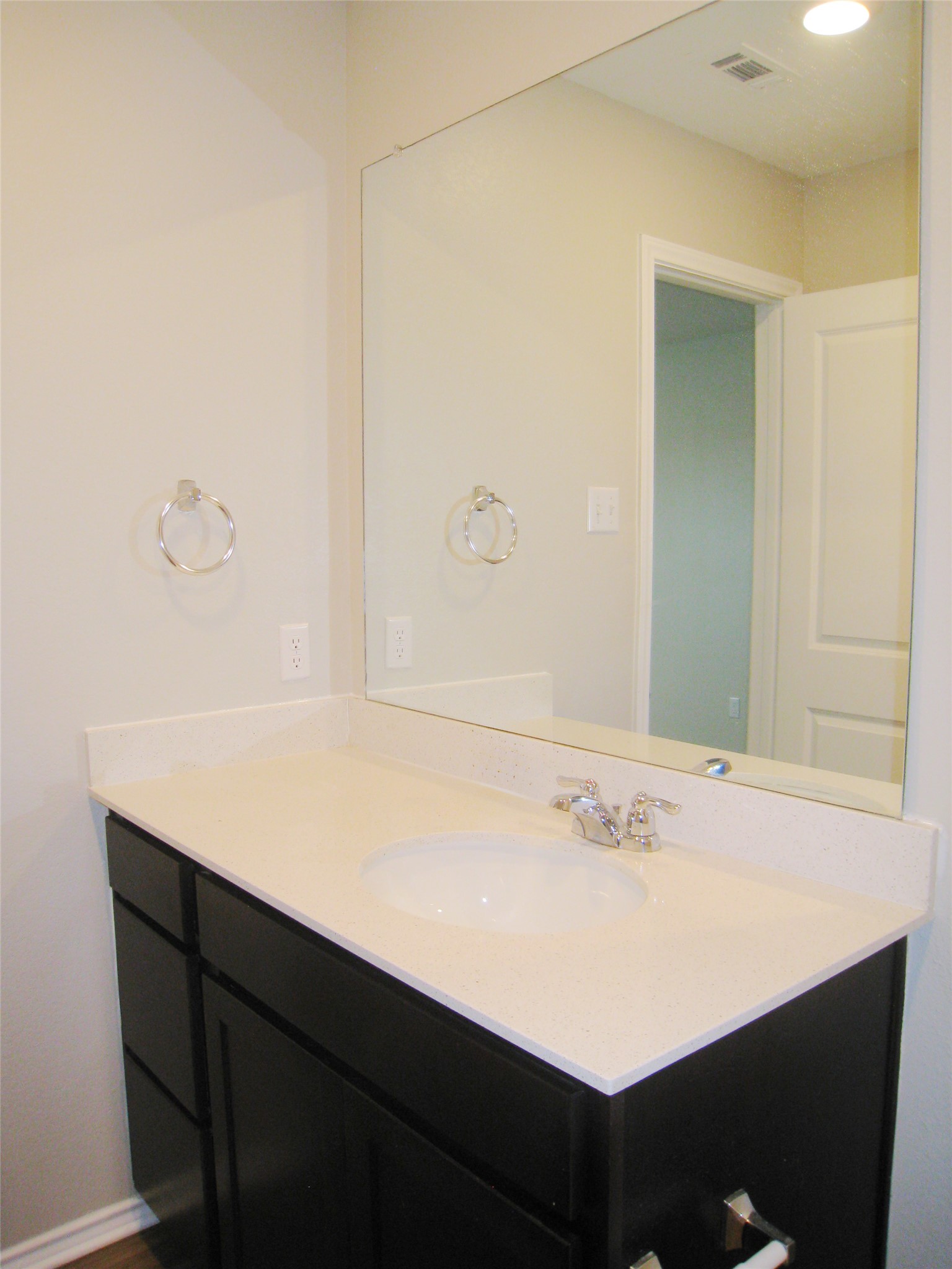 229 Geode Glen Maxwell, TX 78656 - Photo 12 of 19 A pristine vanity with sparkling counters offers a fresh, clean aesthetic.