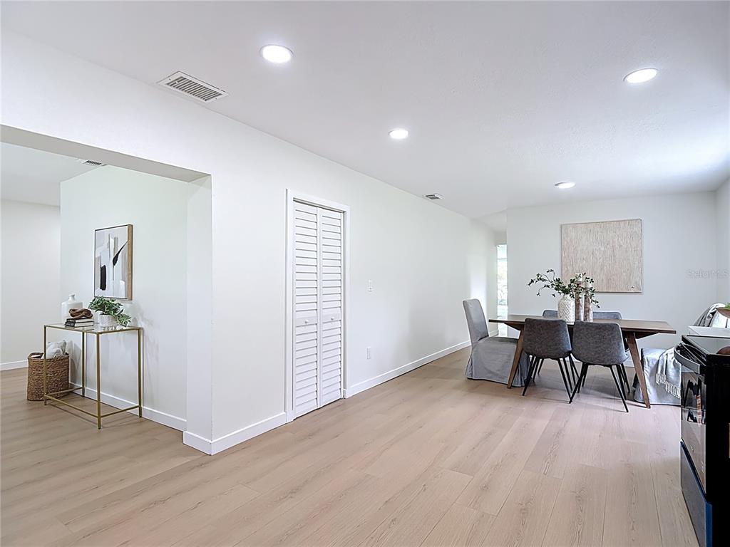 2402 East 148th Avenue Lutz, FL 33549 - Photo 19 of 71 a view of a livingroom with furniture and wooden floor