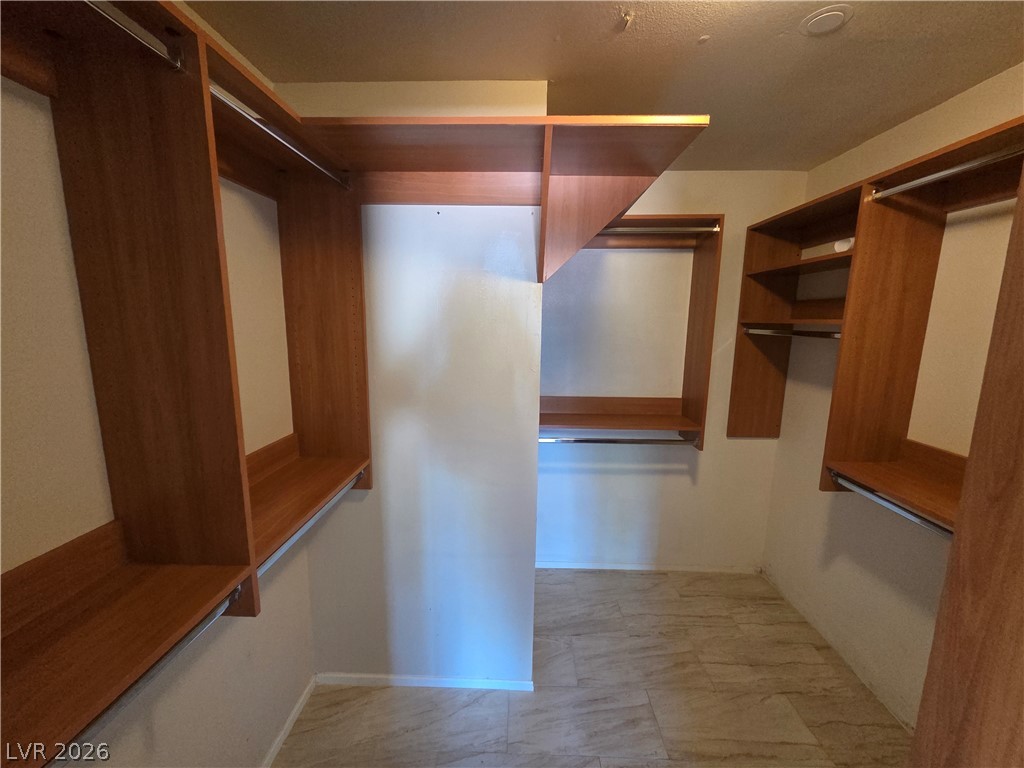 3381 Westwind Road Las Vegas, NV 89146 - Photo 42 of 52 Ample storage options for all your wardrobe needs, thoughtfully designed for practicality.