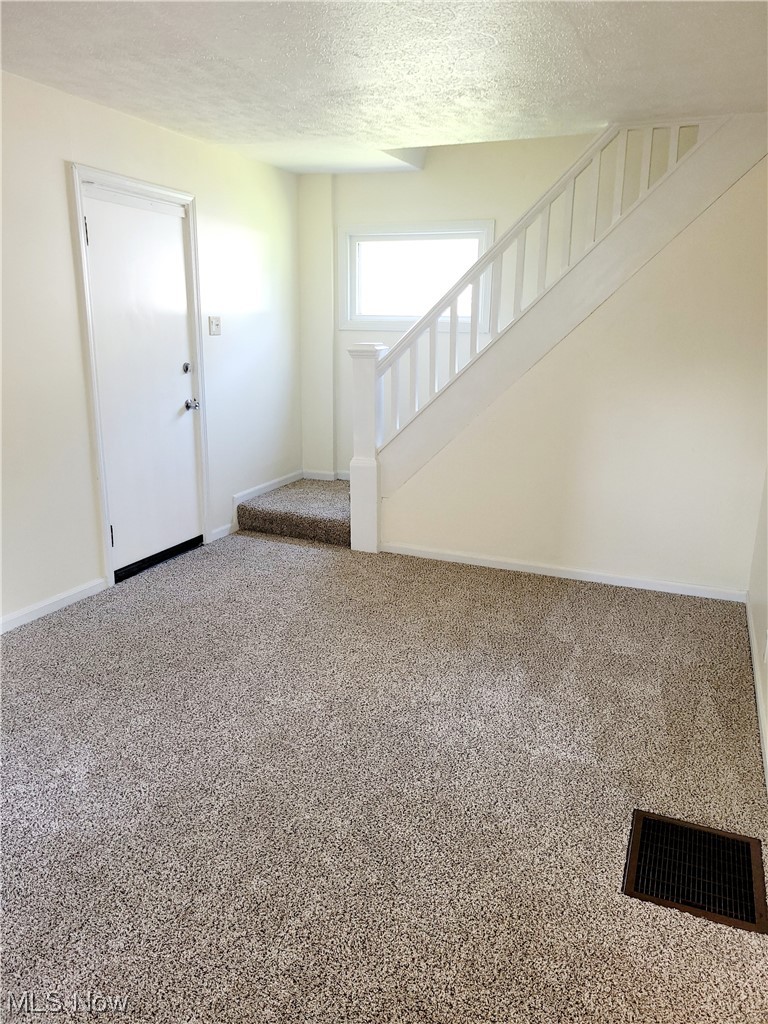 82 North State Street Rittman, OH 44270 - Photo 6 of 17 Living Room & Front Entrance