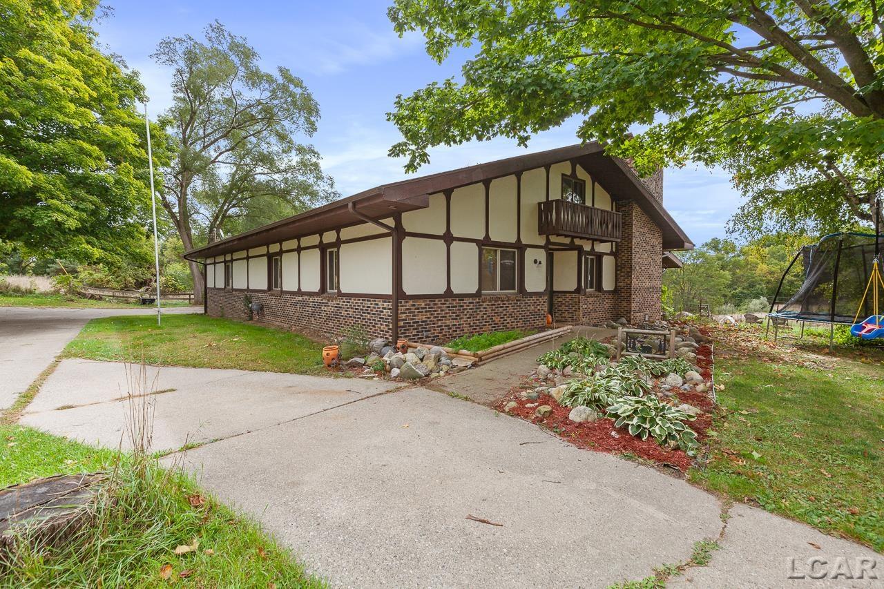 8865 Riverside Road Brooklyn, MI 49230 - Photo 1 of 38