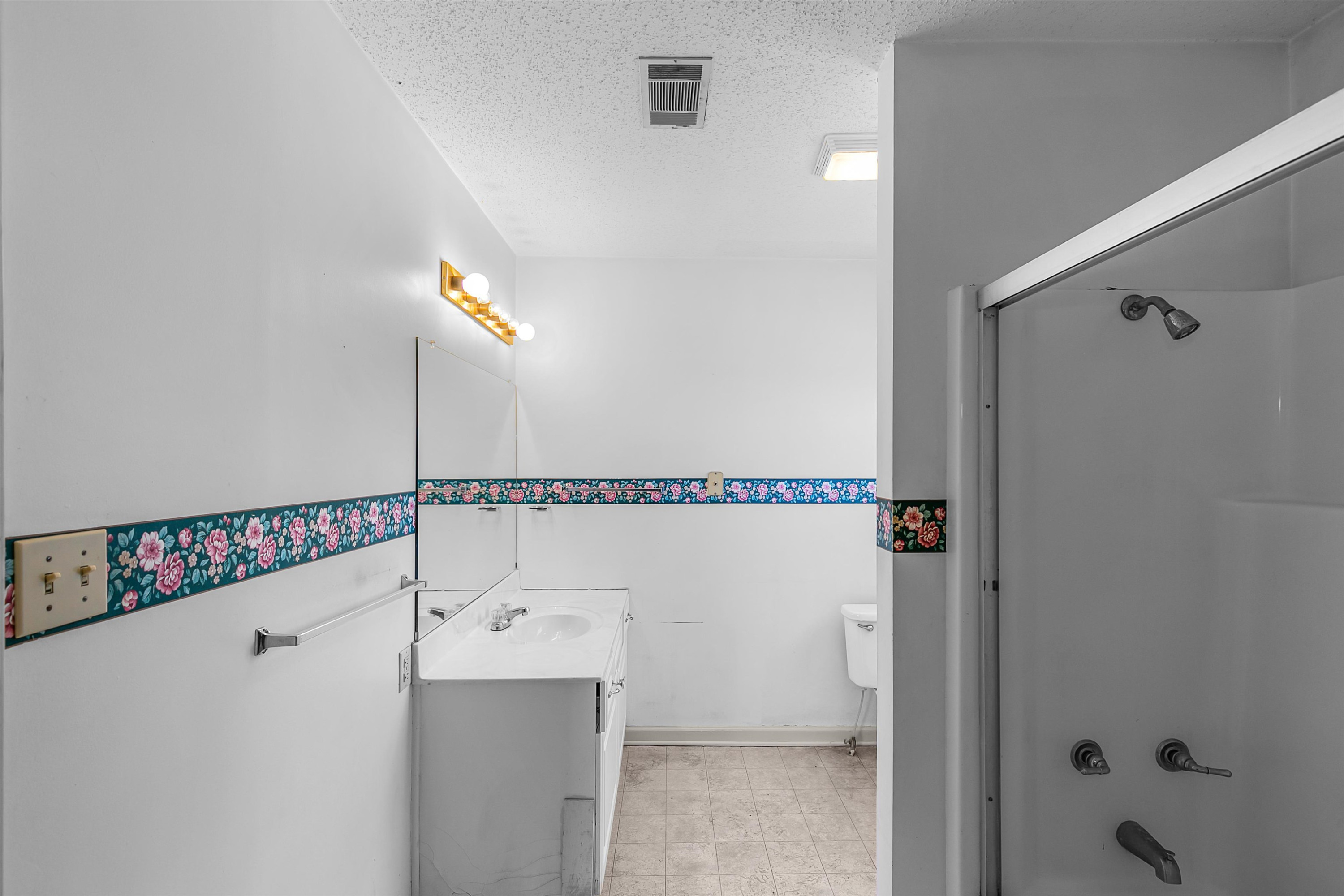 29 Baseline Road Dyer, TN 38330 - Photo 17 of 20 a bathroom with a bathtub and a shower