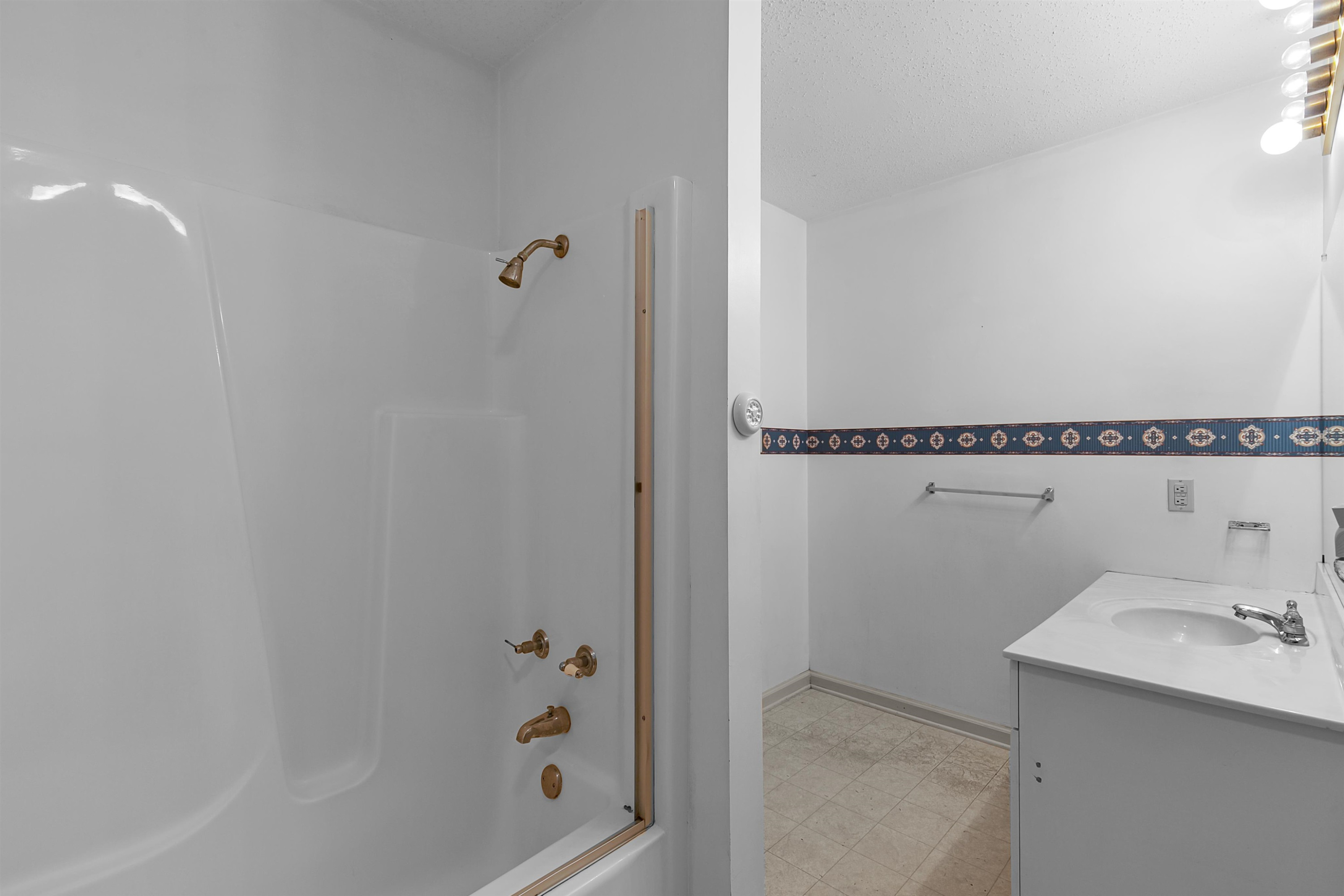 29 Baseline Road Dyer, TN 38330 - Photo 18 of 20 a bathroom with a sink and shower