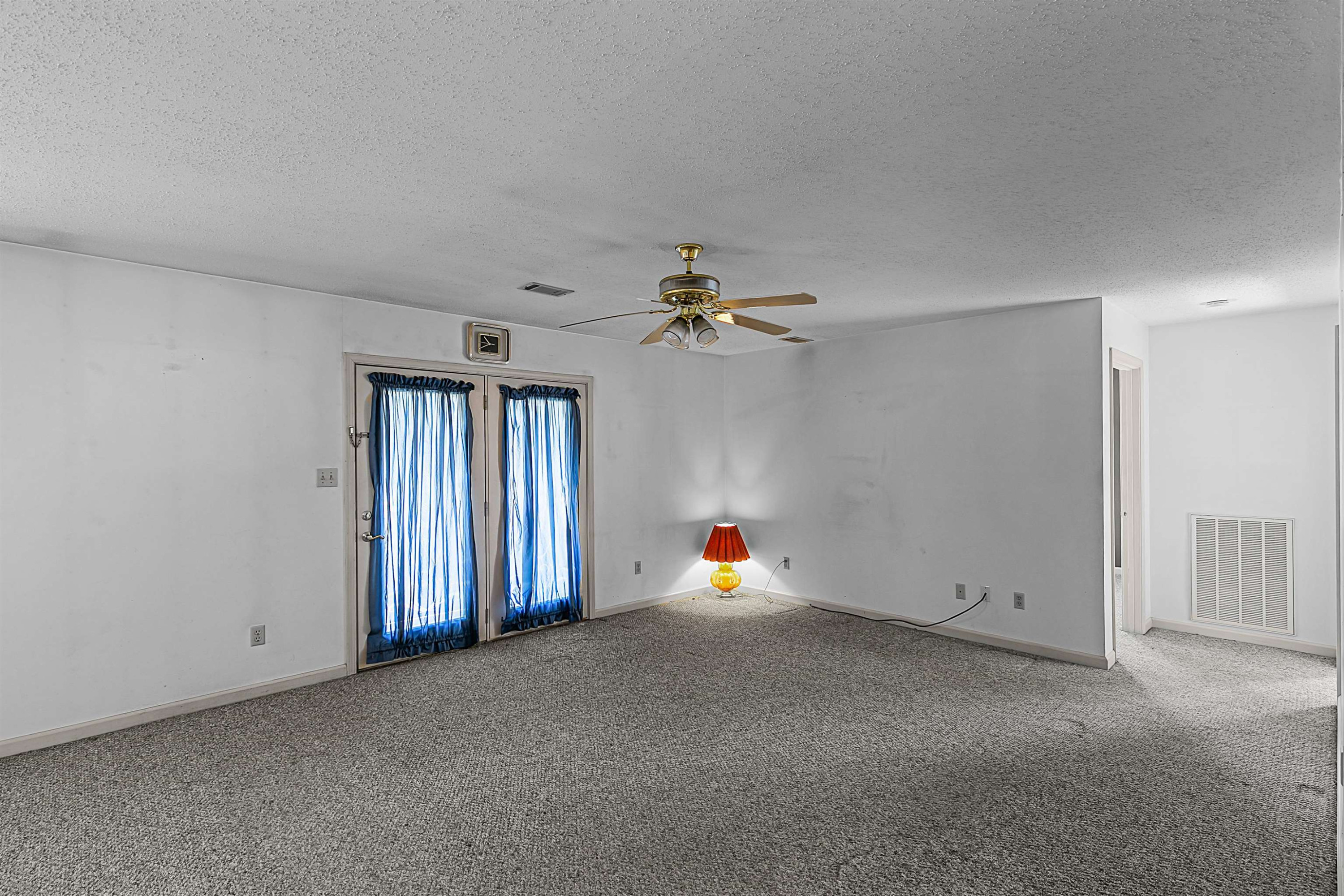 29 Baseline Road Dyer, TN 38330 - Photo 7 of 20 a view of a livingroom with a ceiling fan and window