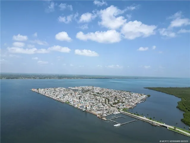 a view of a lake with a city