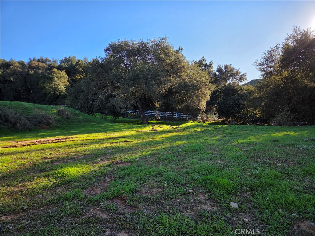 0 Jackson Ranch Road South Silverado, CA 92676 - Photo 13 of 17 a view of a swimming pool with an outdoor space and seating area