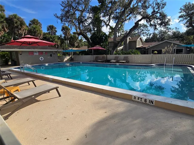 a view of swimming pool with a patio