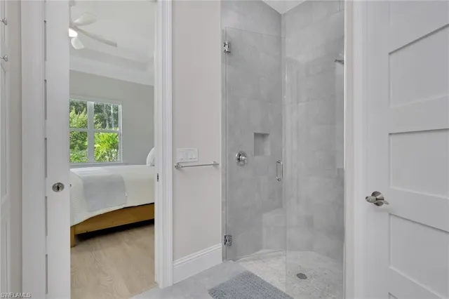 a bathroom with a shower and a tub