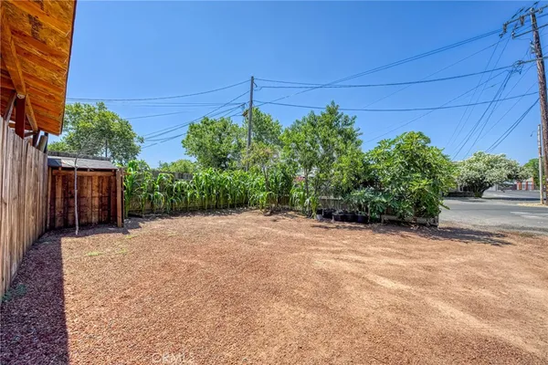 a backyard of a house with lots of green space