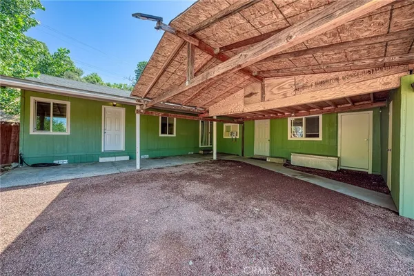 a view of a backyard of a house