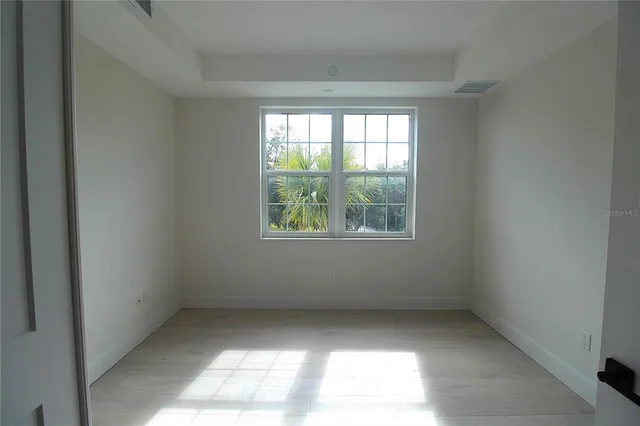 an empty room with windows