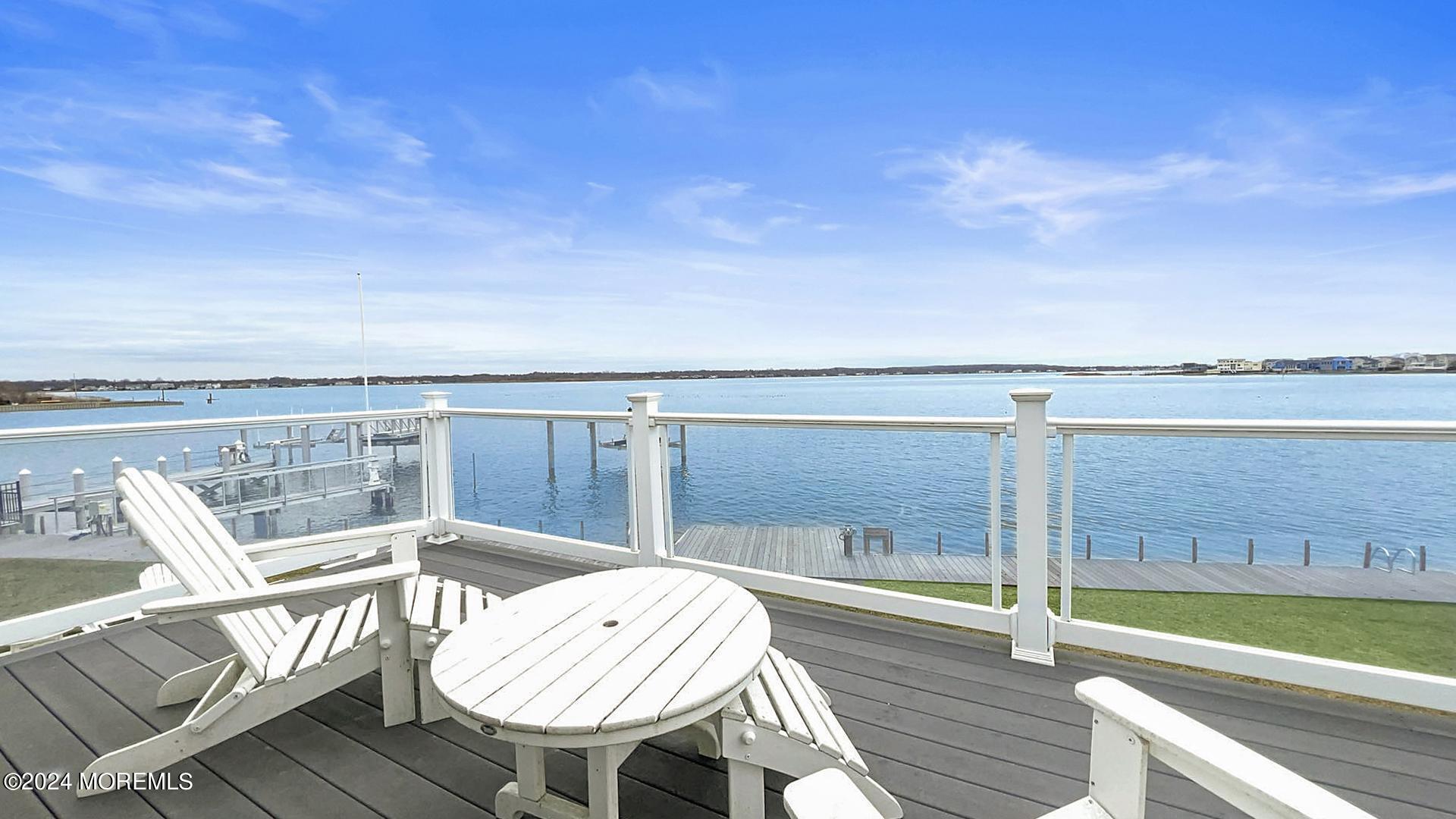 a view of a balcony with chair and table