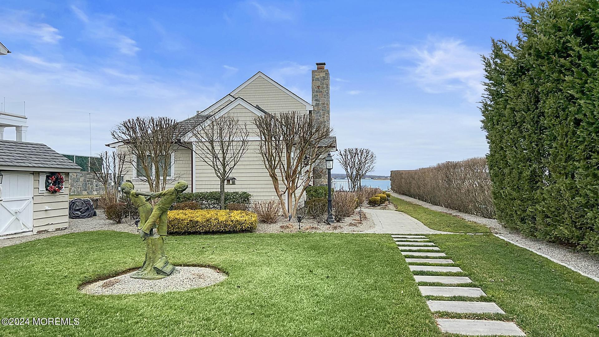 9 Pocano Avenue, Unit A Oceanport, NJ 07757 - Photo 28 of 29 a front view of a house with a yard
