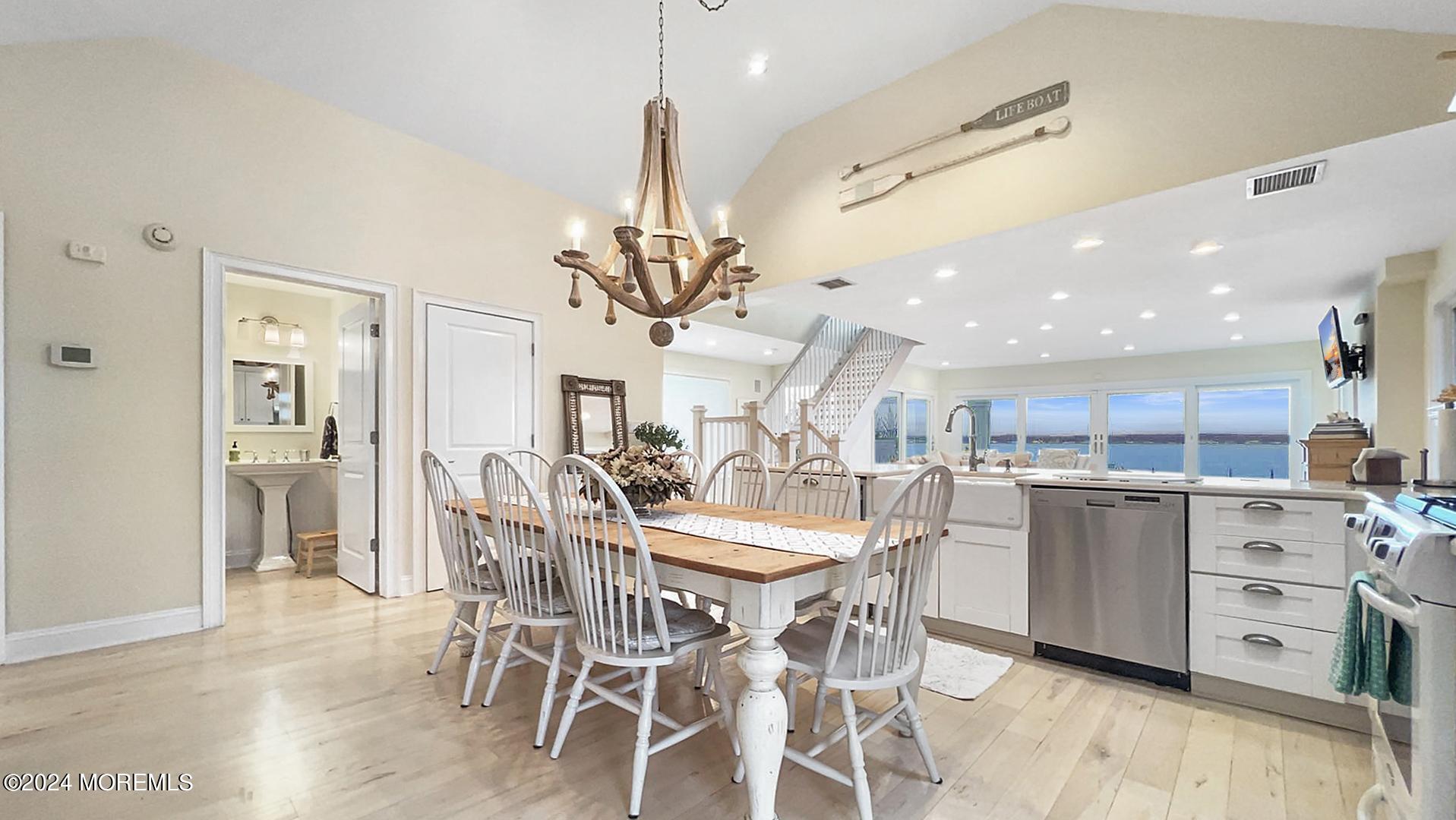 9 Pocano Avenue, Unit A Oceanport, NJ 07757 - Photo 8 of 29 a view of a dining room and kitchen with a table chairs