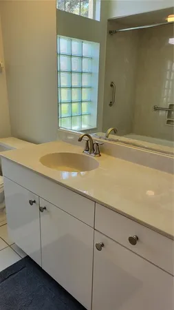 a bathroom with a sink and a bathtub