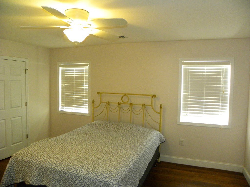 88 Morningview Place Blue Ridge, GA 30513 - Photo 21 of 41 a bedroom with a bed and a window